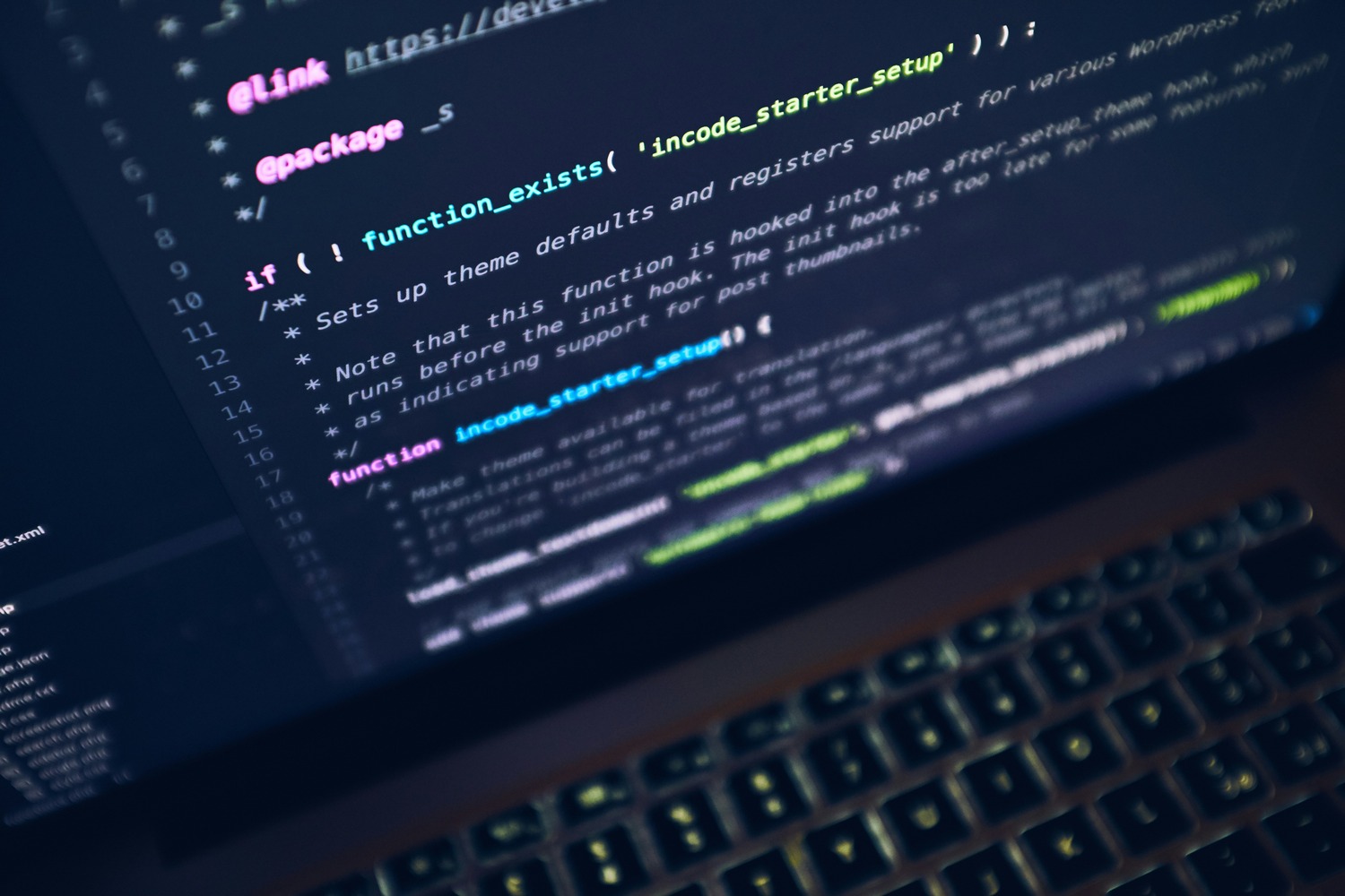 Developer reviewing code on screen while working with an AI coding assistant